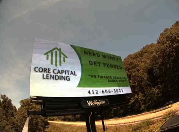 Core Capital Lending digital billboard on McKnight Road
